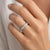 Platinum eternity band ring set with approximately 5.00 carats of round white diamonds. 9.45 grams. Size 5.5. Sizable up...