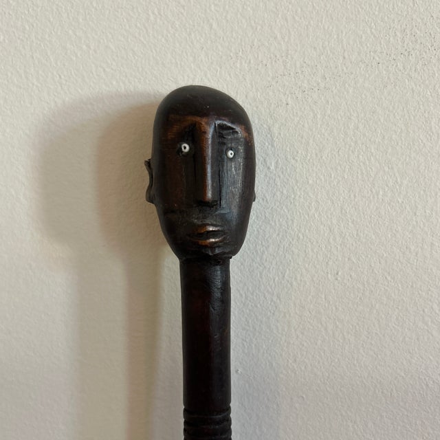 Early to mid 20th century Nyamwezi wooden female stick figure from Tanzania. These are carved from a single piece of...