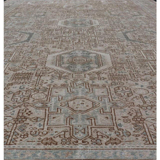 Early 20th Century Vintage Persian Heriz Rug With All-Over Medallion Design in Tan and Blues 9'4 X 12'10 For Sale - Image 5 of 14