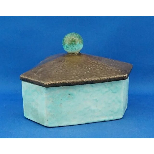Item description: wonderful hexagonal box in art deco style, made of majolica earthenware, glazed in bronze and green,...