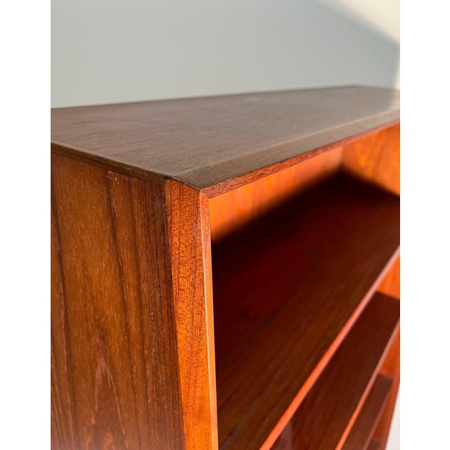 Vintage Danish Modern Designer Bookcase attributed to Johannes Sorth. Note the detail of the finished front fine angular...