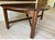 Vintage 1970s campaign Butler’s coffee table. Dark finished wood with brass hardware. Rectangular top with curved drop...