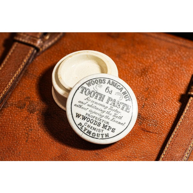 Step back into the elegance of the 19th century with this charming porcelain toothpaste pot, crafted in England. Featuring...