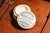 Step back into the elegance of the 19th century with this charming porcelain toothpaste pot, crafted in England. Featuring...