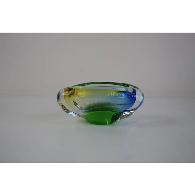 A stunning mid-century modern ashtray made of heavy Bohemian art glass using the sommerso technique. Hand-shaped in...