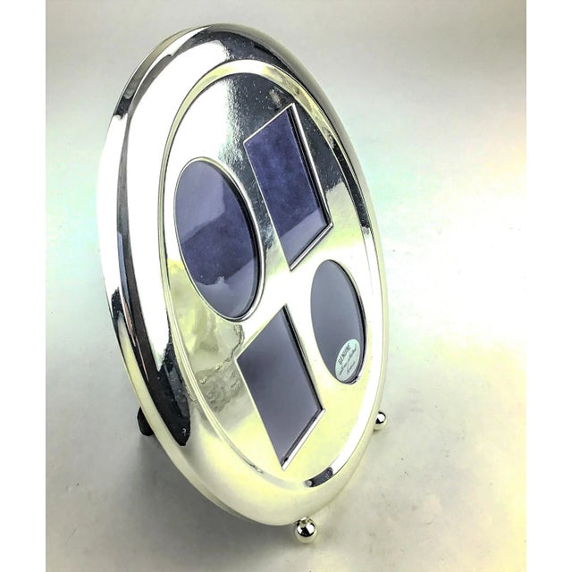 Well preserved photo frame in high quality Silver Plate over Brass. Holds 4 small pics and really packs the WOW factor. In...