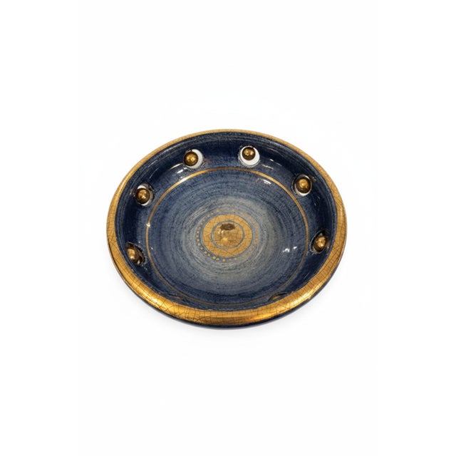 Gorgeous and highly collectible lusterware mid-century modern dish in blue and gold hues by master ceramicist Georges...