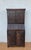 Impressive antique Spanish bureau cabinet dating from the 19th century, crafted in wood and featuring richly carved...
