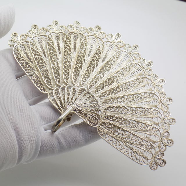 A large and impressive filigree fan figurine, handcrafted in Italy during the 1950s to 1960s. This piece stands out...