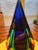 This is a magnificent example of mid-century Italian art glass artistry. This striking 7-inch faceted teardrop obelisk...