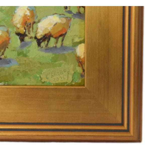 Impressionist oil painting on an artist's hardboard panel of a flock of sheep grazing displayed in a complementary...