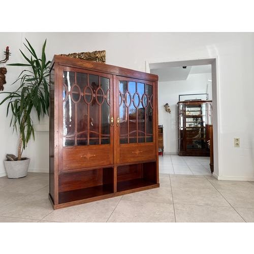 Original Art Nouveau display cabinet/bookcase with mirror and marquetry glazing. Dimensions: Height x Width x Depth 162 x...