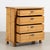 19th century Danish chest of four drawers, crafted in pine with a warm waxed finish that enhances the natural color and...