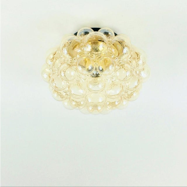 Large mid-century modern amber bubble glass ceiling mount fixtures designed by helena tynell for limburg (germany, 1970s)....