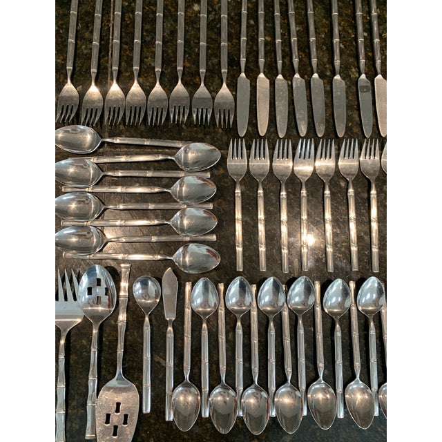 Stanley Roberts stainless flatware service for 8 in “Tiburon” a faux bamboo pattern. Discontinued 1980s flatware set made...