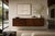 Rare Mid Century Modern floating cabinet / credenza crafted in richly grained rosewood veneer with an architectural,...