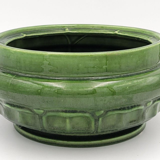 An Arts & Crafts bowl, U.S.A. circa 1930. Hard water stains to inside.