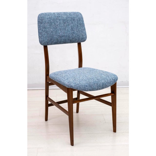 Six beautiful chairs designed by Edmondo Palutari for Dassi, the chairs are made of teak and have been restored and...