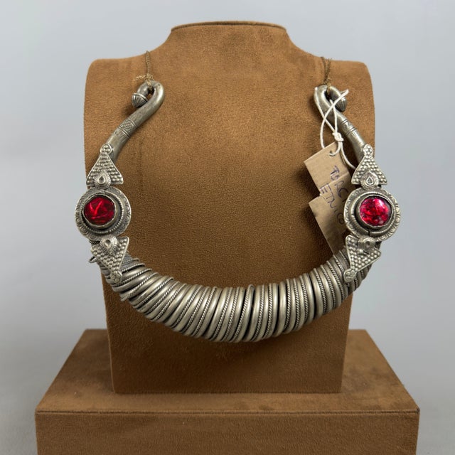 A traditional piece of jewelry with a tribal allure and extraordinary visual impact. This rare and massive nomadic torchon...