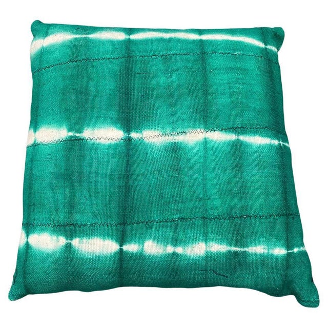 Green over-dyed mud cloth Mali textile from West Africa, made into a pillow. Double backed with concealed zipper. Insert...