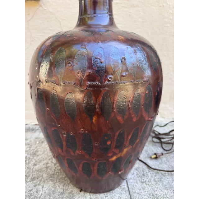 A substantial and commanding table lamp in hand-thrown studio pottery, likely Italian, dating to the 1960s or early 1970s....