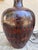 A substantial and commanding table lamp in hand-thrown studio pottery, likely Italian, dating to the 1960s or early 1970s....