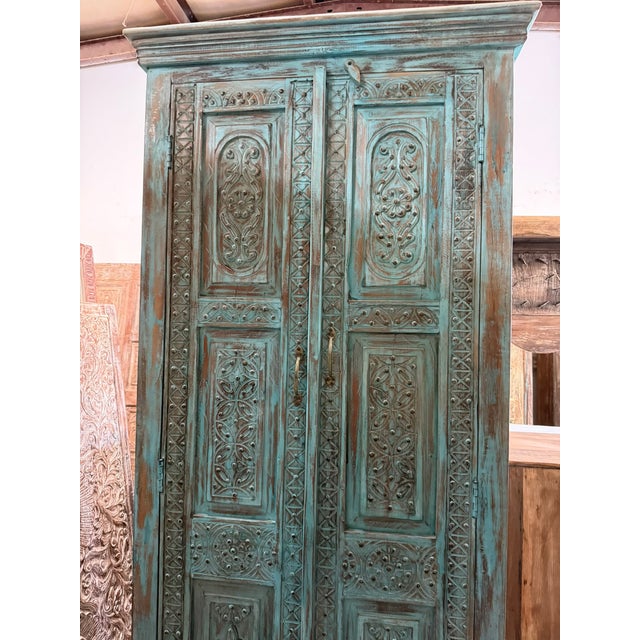 Antique Blue Hand-Carved Armoire With Brass Studs – Floral Statement Bedroom Cabinet For Sale In Orlando - Image 6 of 8