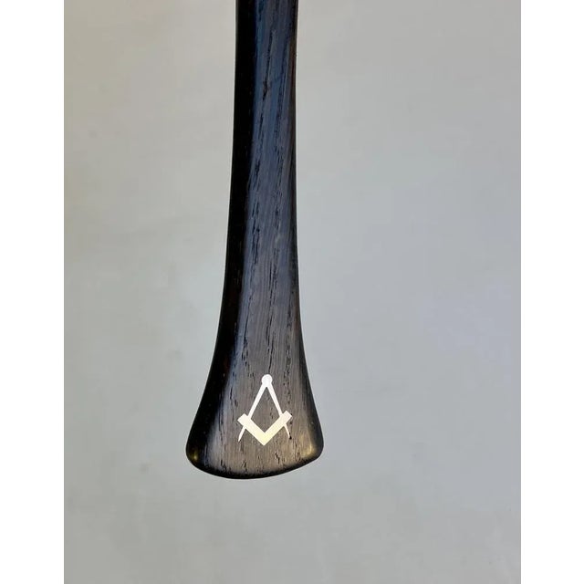 Hans Hansen bottle opener executed in +200 years old bog oak and inlaid with sterling silver. A number of 100 piece were...