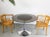 Mid-Century Round Smoked Glass Dining Table in Chrome Tulip Base by Eero Saarinen, Germany, 1975 For Sale - Image 6 of 7