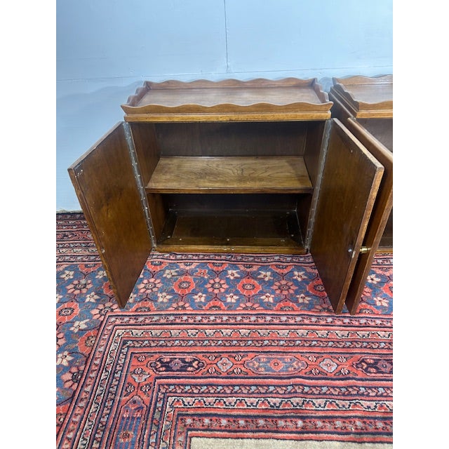 Enhance your bedroom with this Pair of High-Quality Wood Nightstands with Carved Wood Panels. These nightstands are...