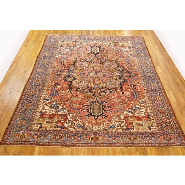 Antique Hand-Knotted Persian Heriz Oriental Carpet A one-of-a-kind antique Persian Heriz oriental carpet, hand-knotted...