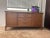 stunning mid century modern dresser / sideboard / buffet / cabinet made by United furniture corporation. This fabulous...