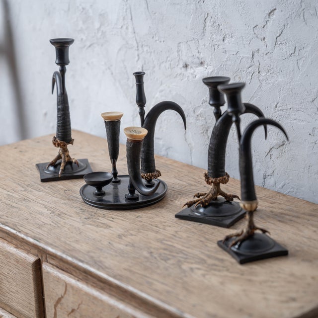 A Black Forest chamois horn and claw desk set with candle holders, 19th century. The desk set includes pounce pot and...