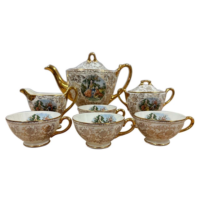 These are Vintage Homer Laughlin Eggshell Georgian Porcelain Tea Set featuring "courting couple" style design with...