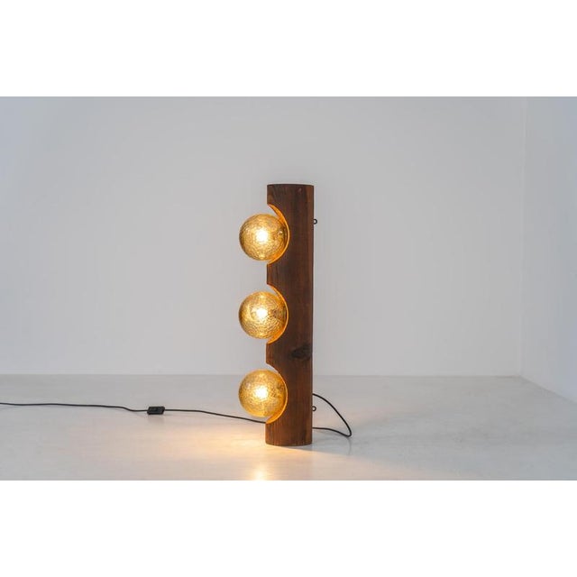 Sculptural floor lamp by Temde Leuchten (Switzerland, 1970s). This exceptional piece combines an organic form with a...