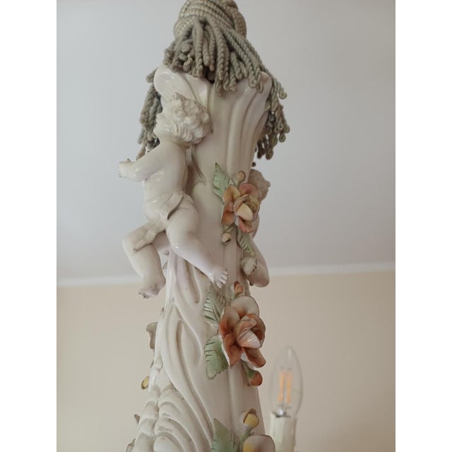 Capodimonte porcelain chandelier, white and pastel colors, with a cheerful, spring-like, and Mediterranean feel, six arms,...