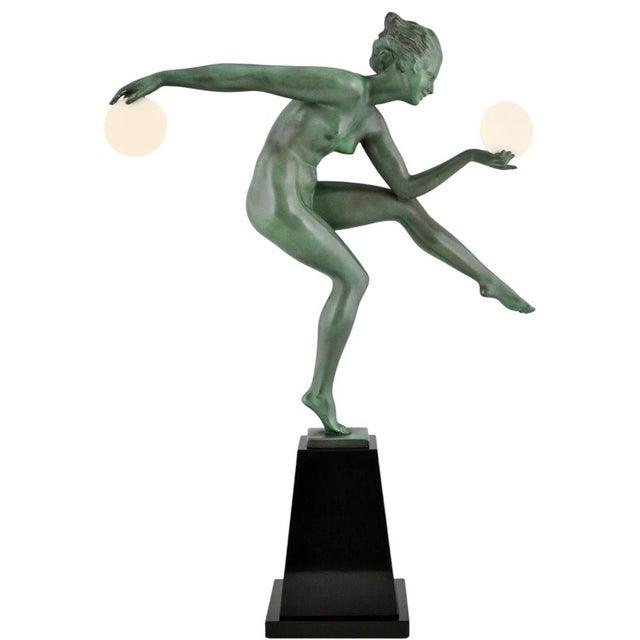 Art Deco sculpture nude disc dancer by Derenne. Pseudonym used by Marcel Bouraine for his art metal sculptures cast at the...