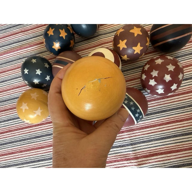 This set of 12 patriotic American hand-painted wooden decoration balls is a perfect addition to your 4th of July decor....