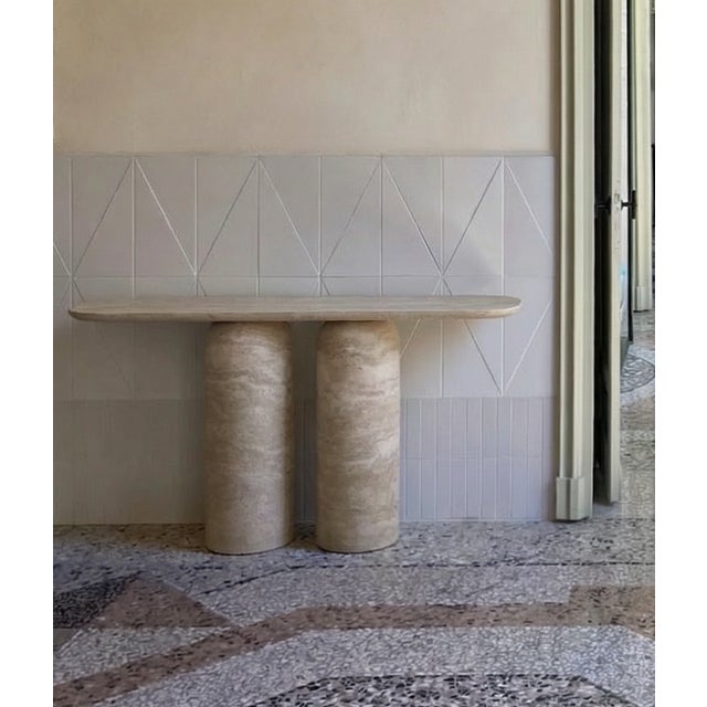 Made from high-quality travertine. 2 x dome-topped pedestals are an sculpture in themselves. Rounded-edge tops appear to...