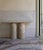 Made from high-quality travertine. 2 x dome-topped pedestals are an sculpture in themselves. Rounded-edge tops appear to...