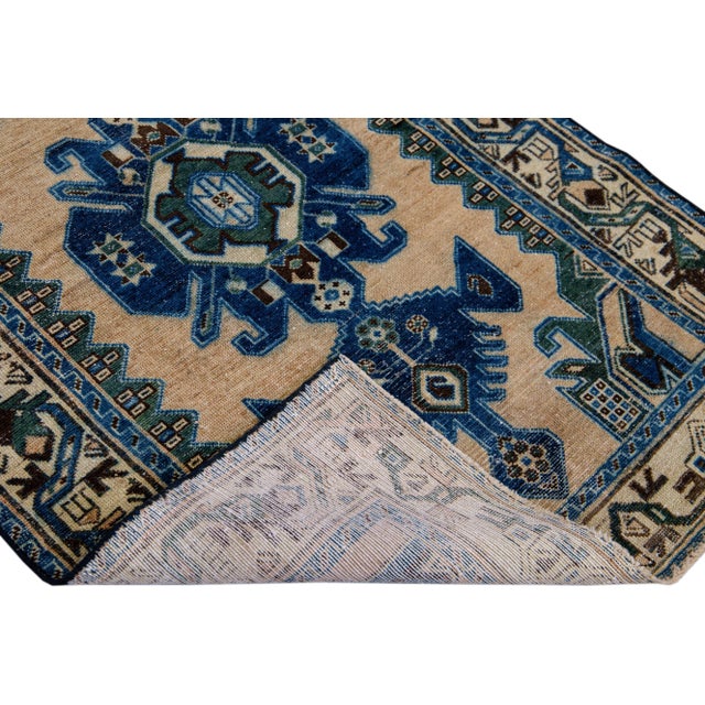 Beautiful Vintage Shabby Chic hand-knotted wool rug with a beige field. This rug has navy blue accents all-over a...