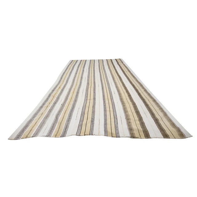 Vintage handwoven Oversized kilim rug from Afyon region of Turkey. Approximately 50-60 years old. In very good condition.