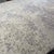 This elegant 10' x 14' rug, hand-knotted in Nepal, features a modern abstract design rendered in beautifully textured...
