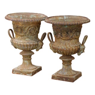 Pair of Early 20th Century French Painted Iron Urns With Figural Mask Handles For Sale