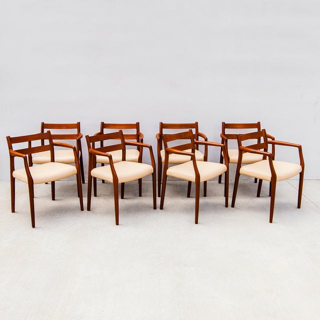 A vanishingly rare set of eight Model 67 arm chairs by Niels Otto Moller, designed in 1976 and produced in Denmark by J.L....