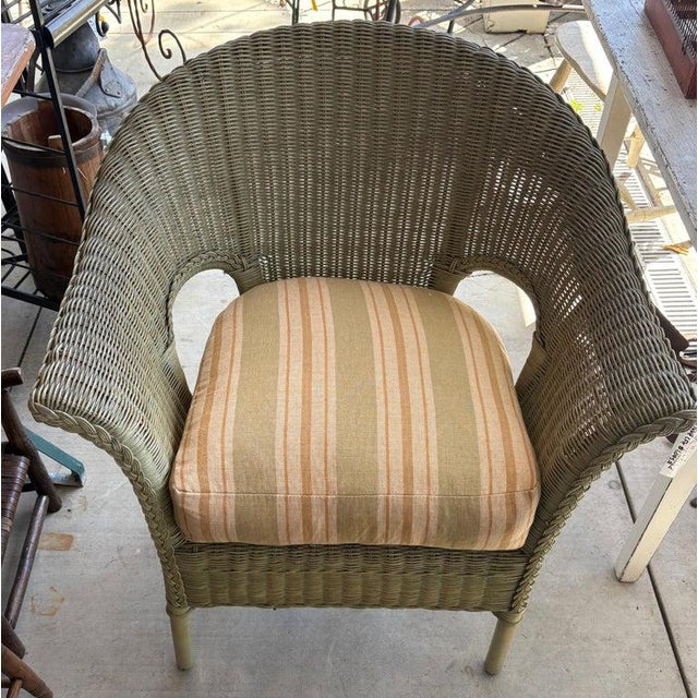 1930's Bar Harbor original green painted wicker chair in fine condition.The ticking cushion is in yellow & green colors...