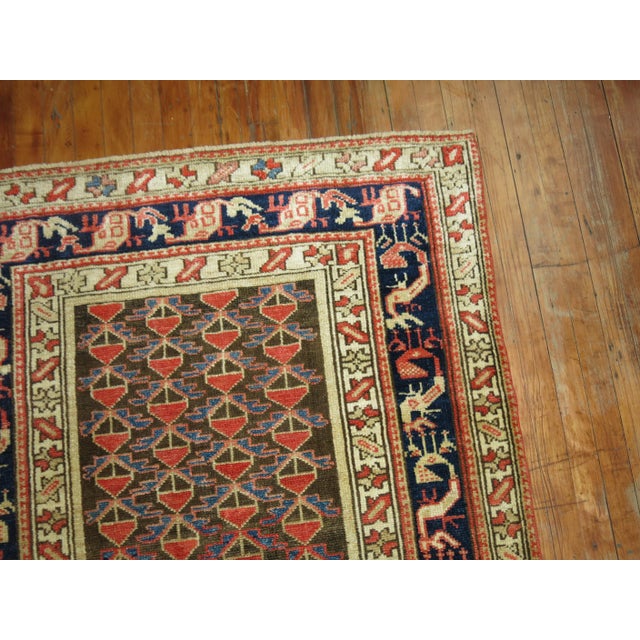 A decorative Persian Malayer wide runner from the 1930's Size: 3'9” x 15'3”.