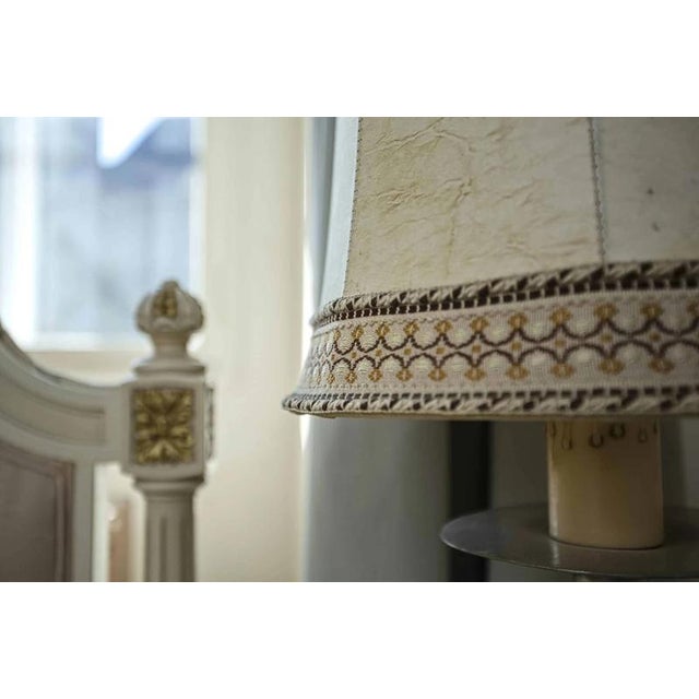 Very decorative lamp made of white brass with a decorative shade. Fully functional. The lamp is for one bulb with a...