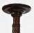 An early 20th century tall Honduran mahogany torchere with spiral turned support, and tripod legs. Circa 1910. The...
