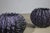 Set of 2 monumental vessels in lacquered resin in a purple and black mélange of the late 80s. They were part of the...